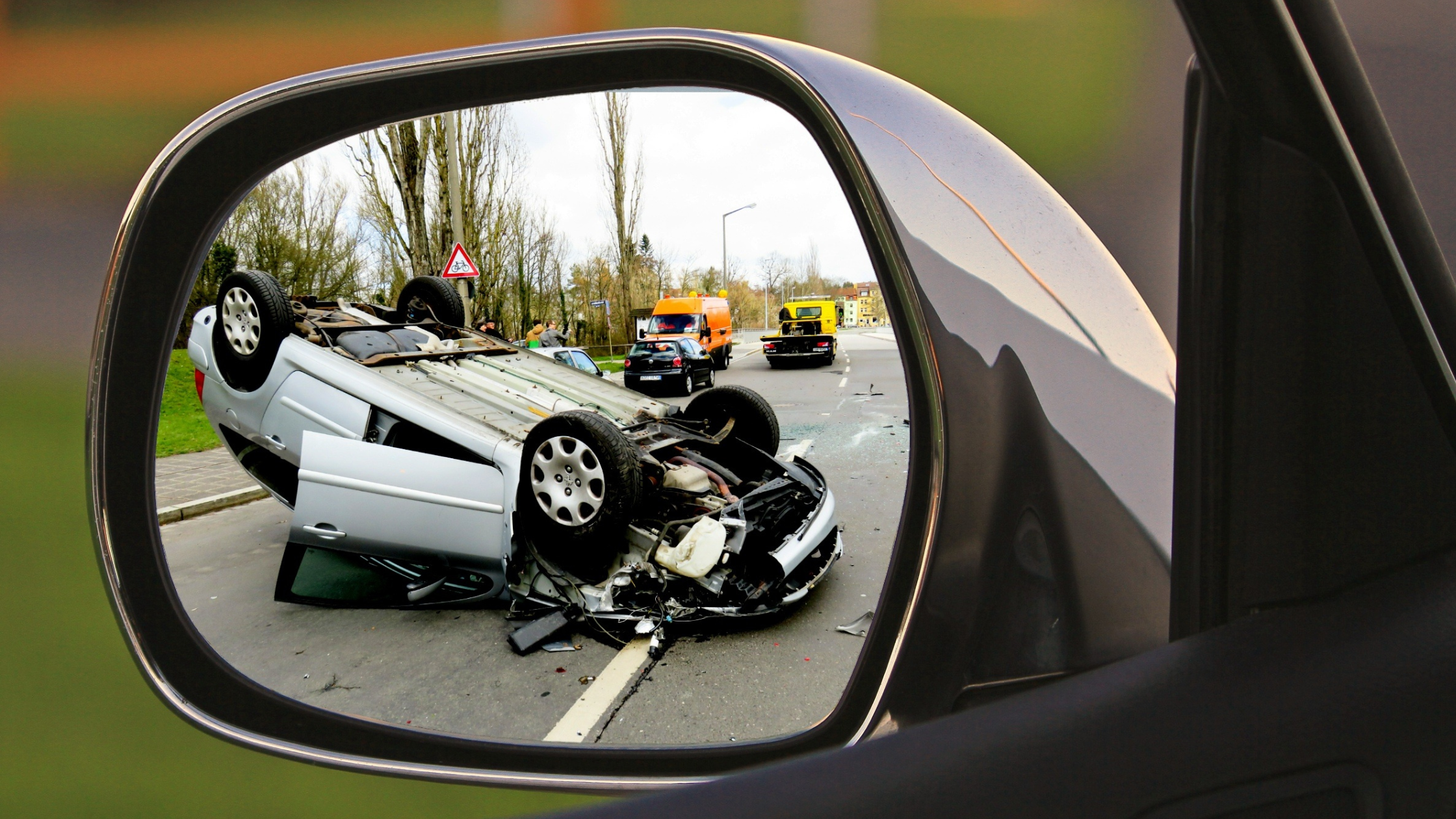 car flipped over in rear view mirror